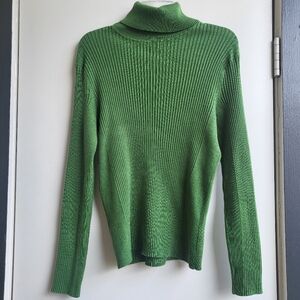 Grass green turtleneck sweater.